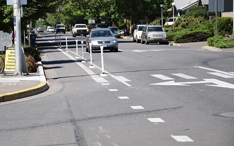 Photo of an at-grade separated bike lane.